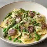 Asparagus Ravioli with Sausage and Peas Recipe
