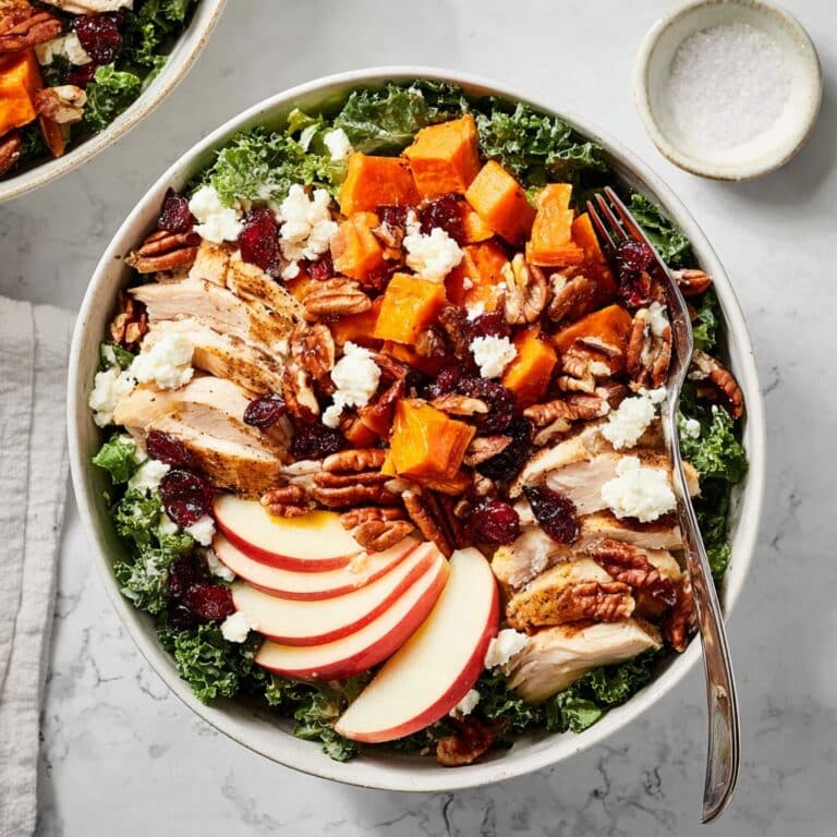 Fall Harvest Kale Salad with Roasted Sweet Potatoes, Chicken, and Cranberries Recipe
