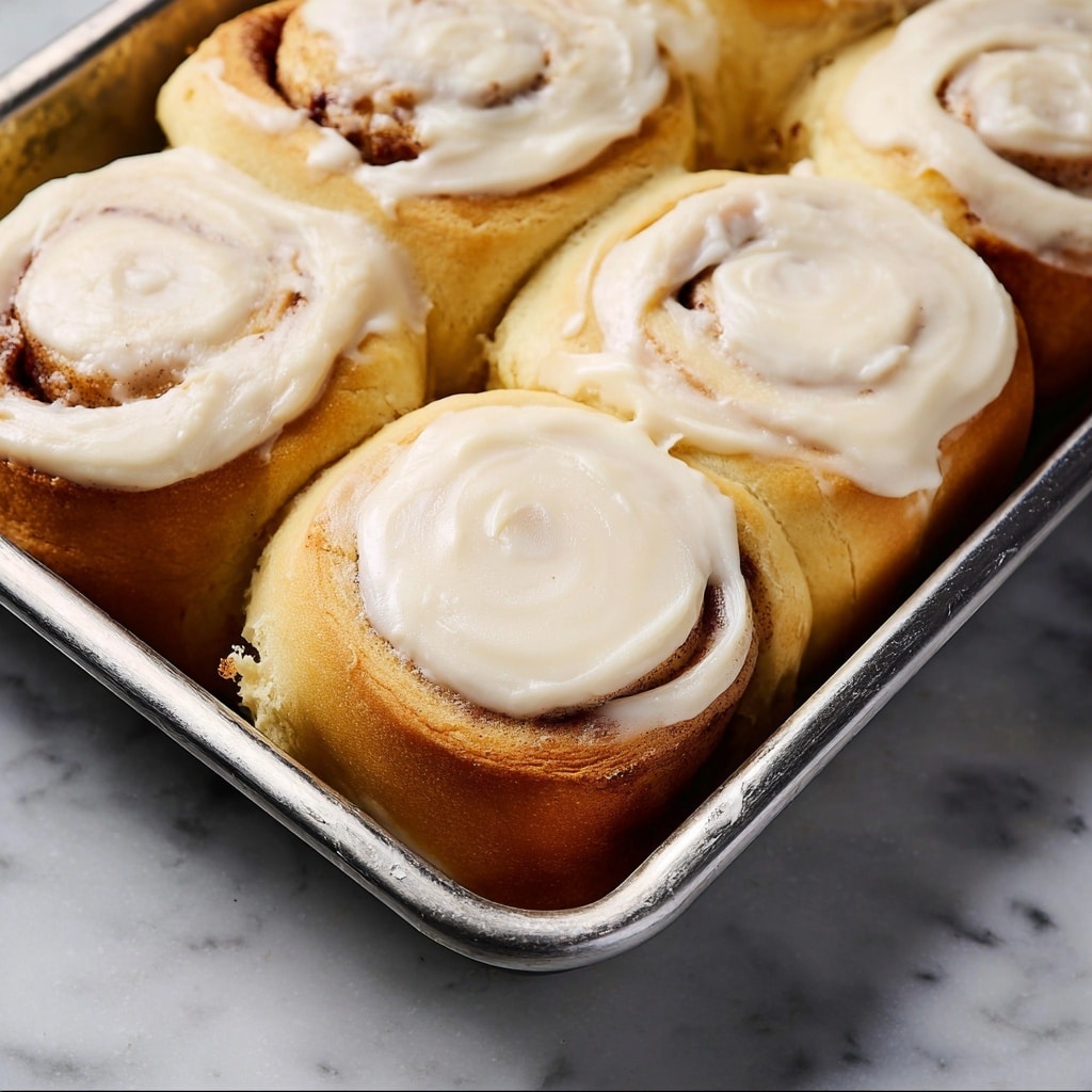 Homemade Cinnamon Rolls with Maple Cream Cheese Frosting Recipe - Recipe Image